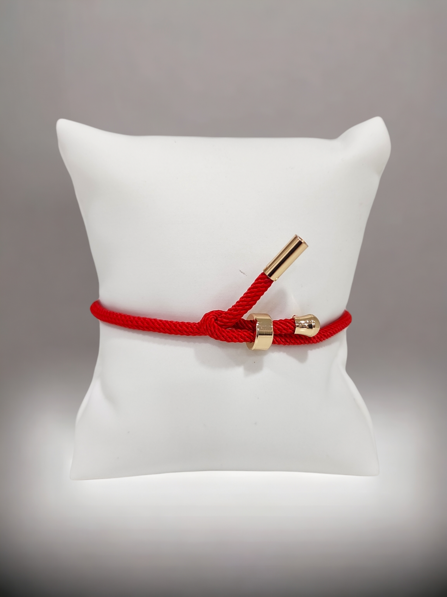 Color braided bracelet with charm